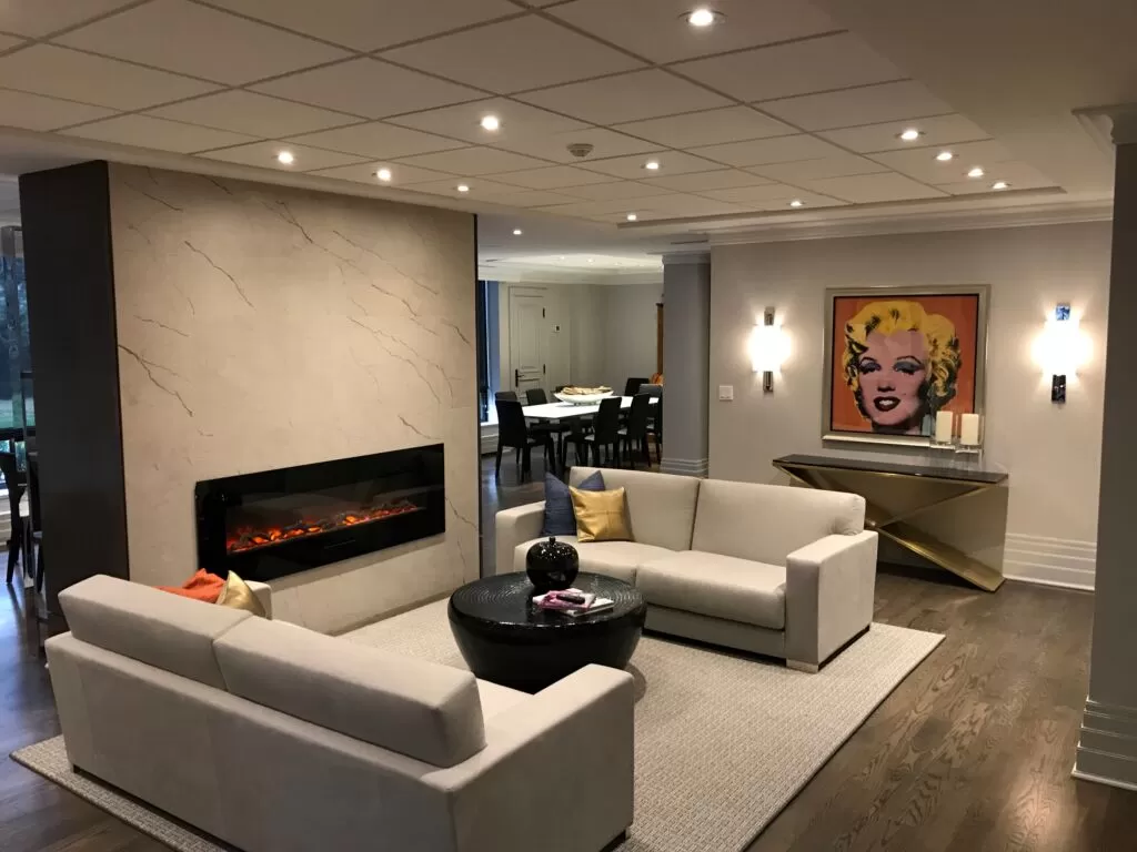 Veined fireplace feature wall with a long horizontal fireplace