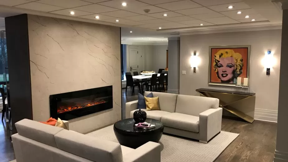 Veined fireplace feature wall with a long horizontal fireplace