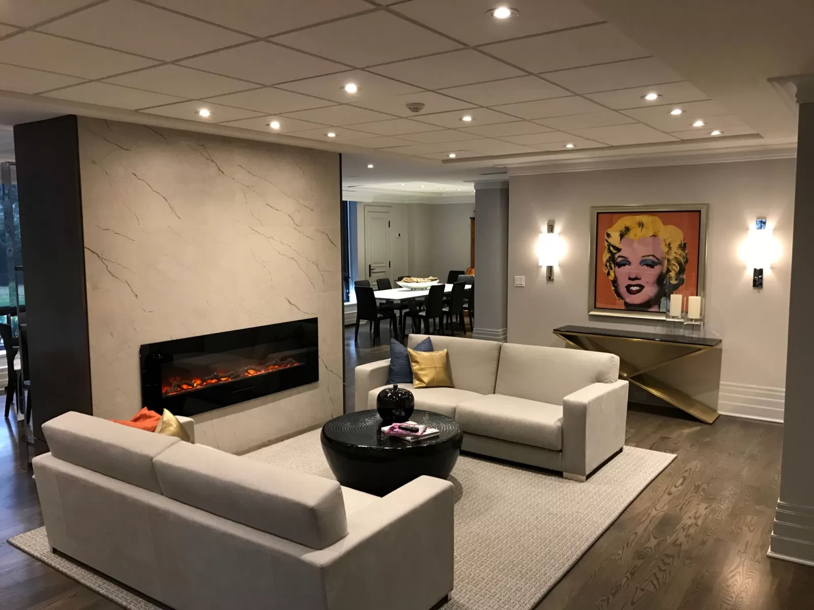 Veined fireplace feature wall with a long horizontal fireplace