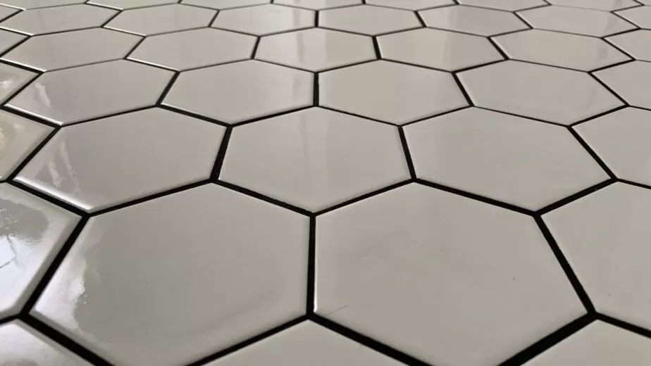 White hexagon tile with dark contrasting joints