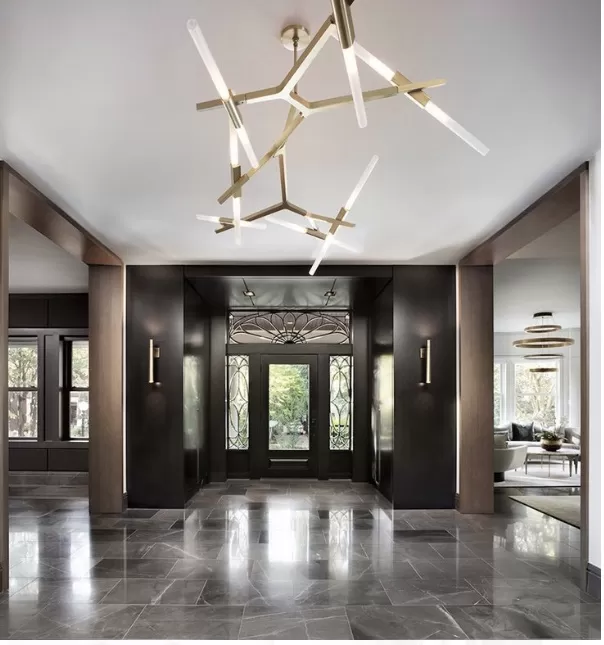 Grey veined entrance floor with a straight grid layout